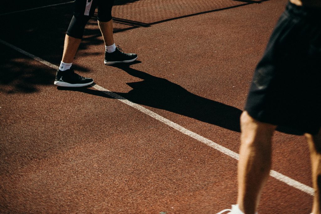 Athletes on an outdoor sports court